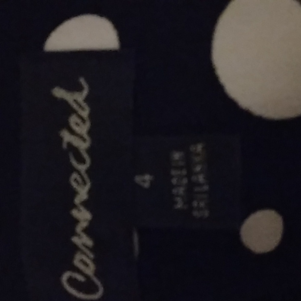 Connected black and white poke a dot mid length dress